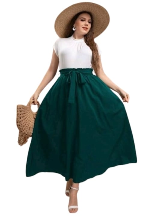 Красиви и Стилни Дамски Поли - Какво Предлага Мода 2025 Година Дълга зелена пола